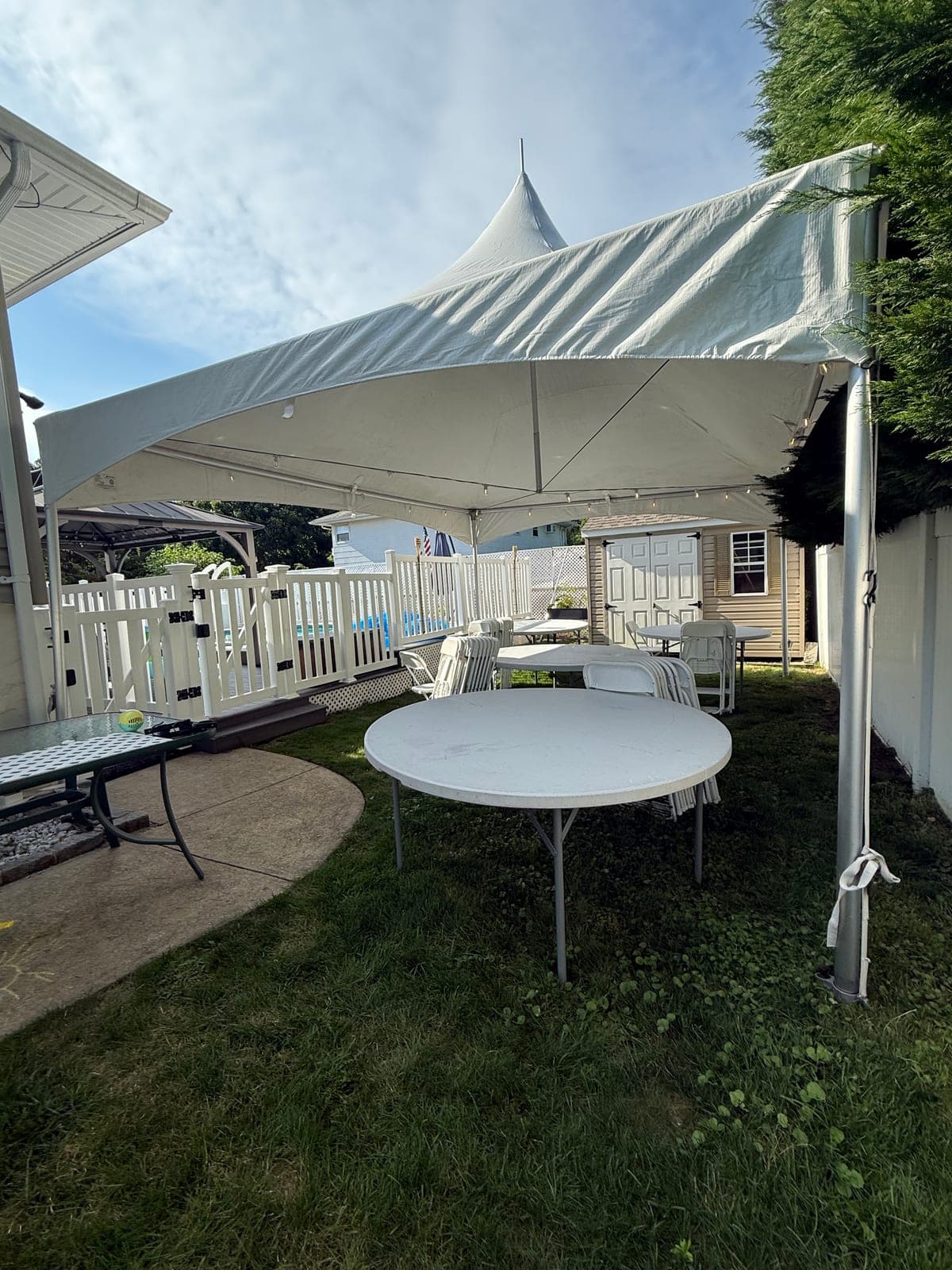 15 by 20 high-peak tent: 15×20 over the patio by the pool