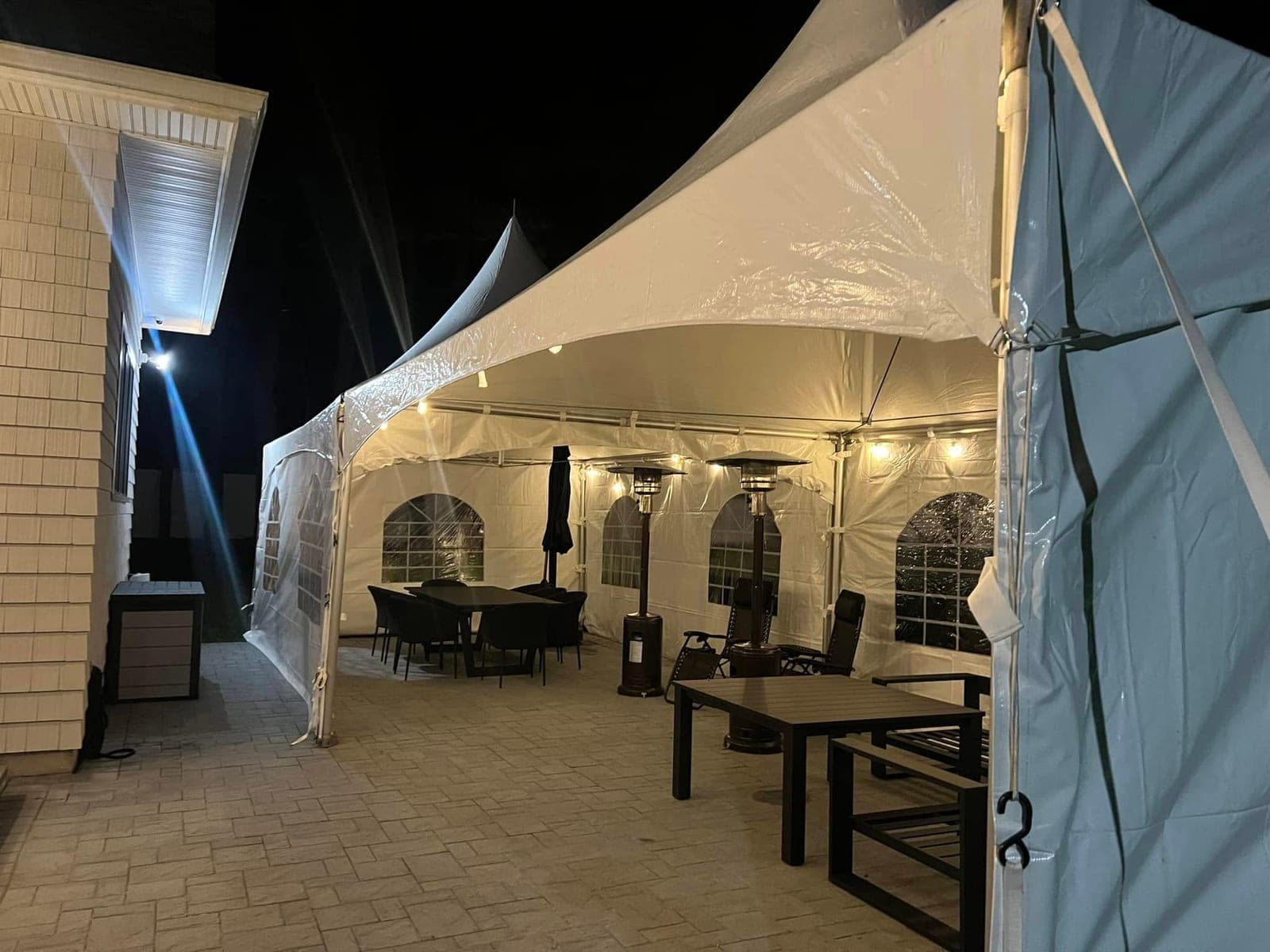 15 by 40 high-peak tent: Under the tent at night