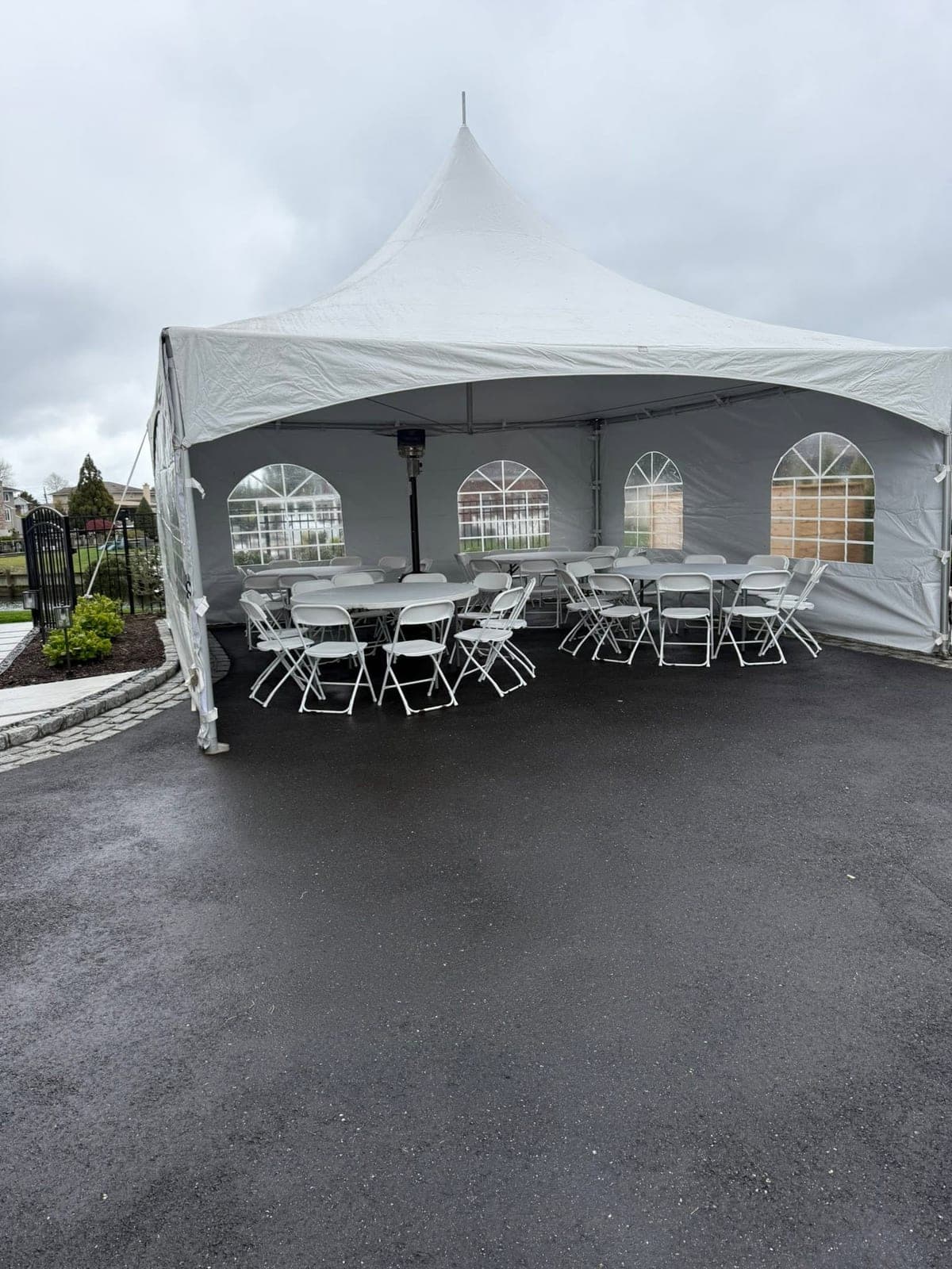 15 by 40 high-peak tent: Down the driveway, rounds set