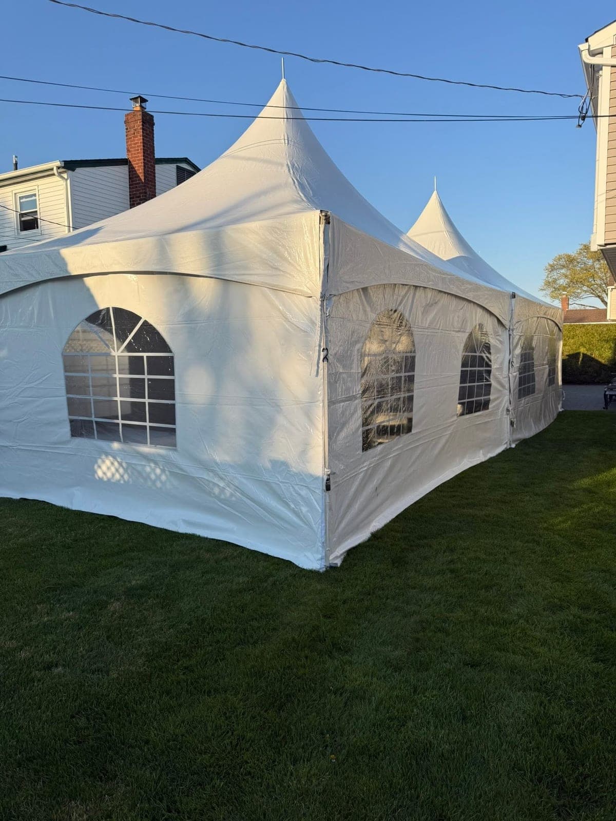 15 by 40 high-peak tent: Long run along the house