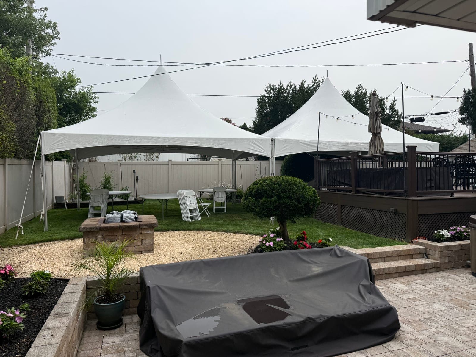15 by 40 high-peak tent: 15×40 by the deck, lights strung