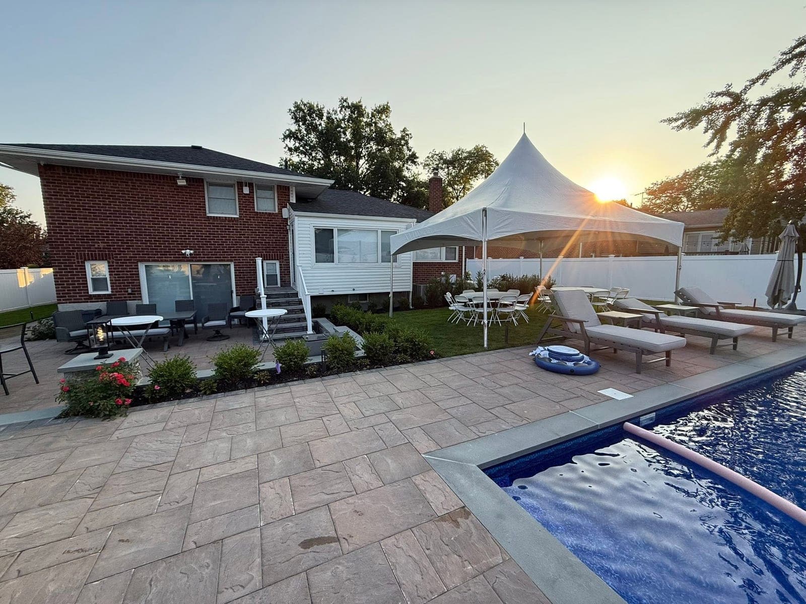 20 by 20 high-peak tent: Poolside at sunset