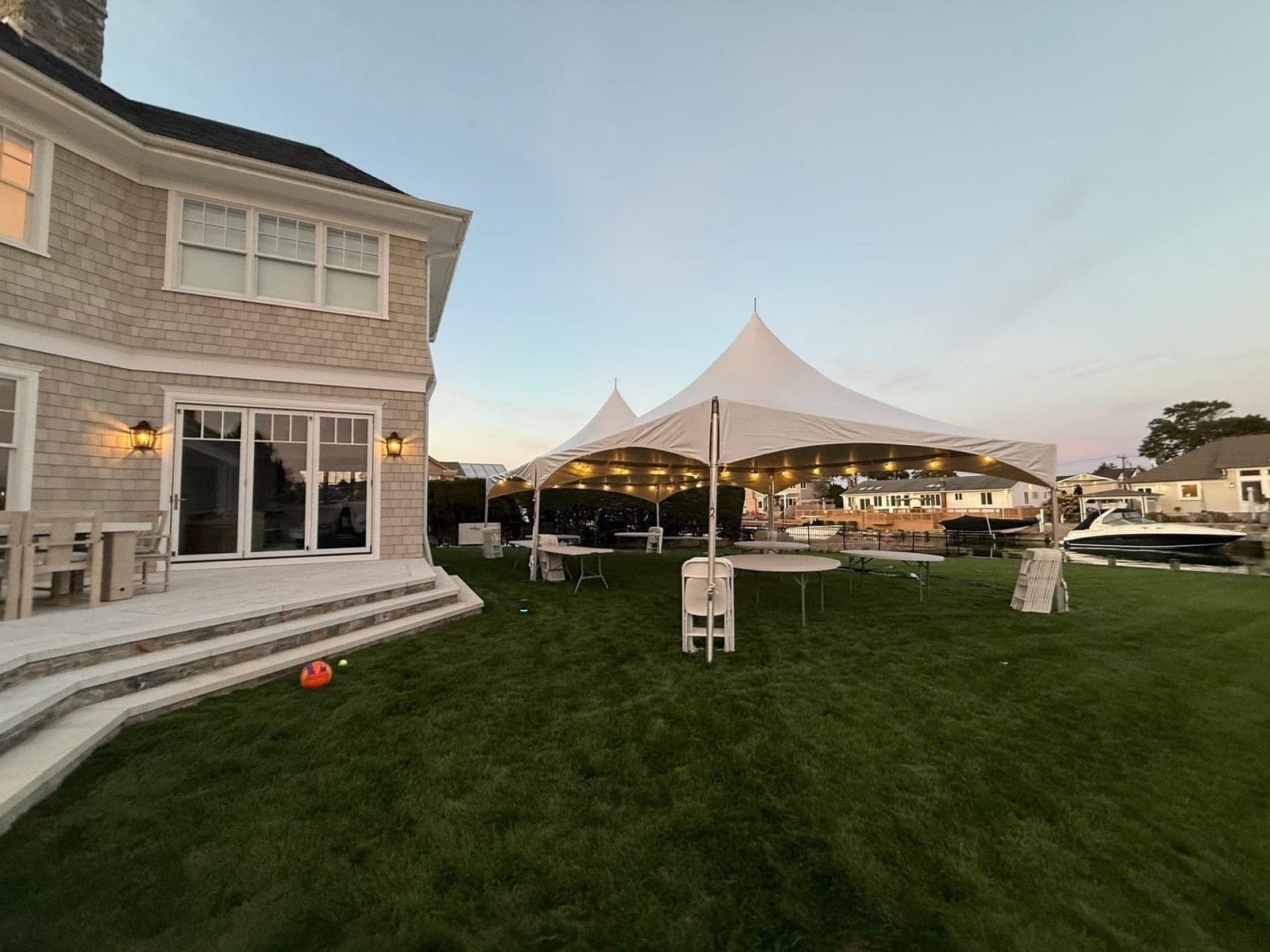 20 by 20 high-peak tent: Sunset by the house