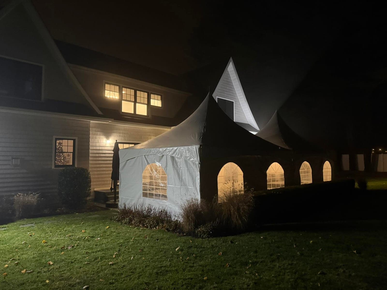 20 by 20 high-peak tent: Evening, sides on, glowing