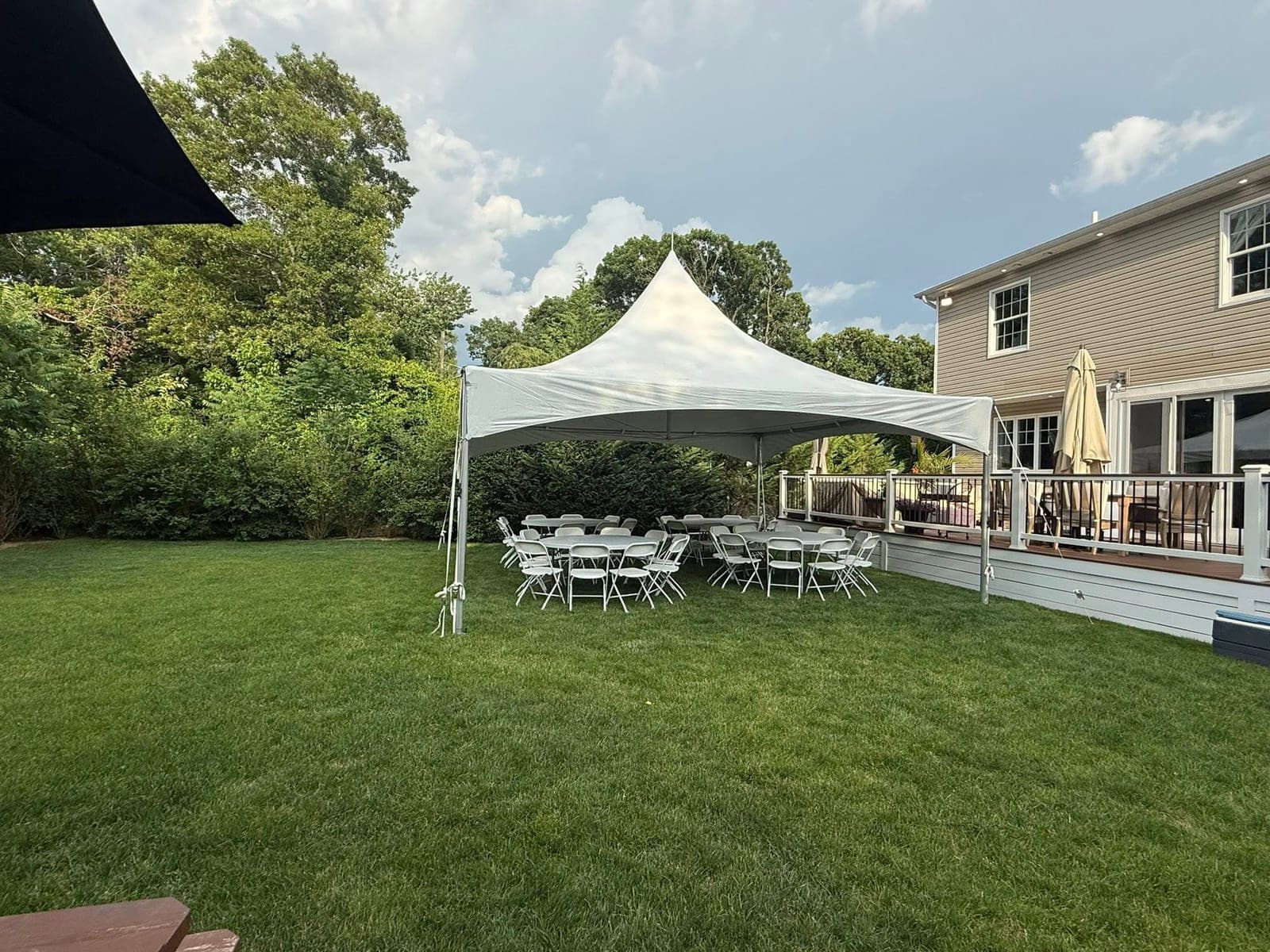 20 by 20 high-peak tent: Rounds on the lawn