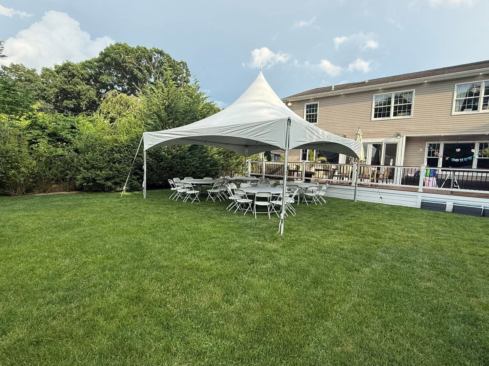20 by 20 high-peak tent: Rounds by the house