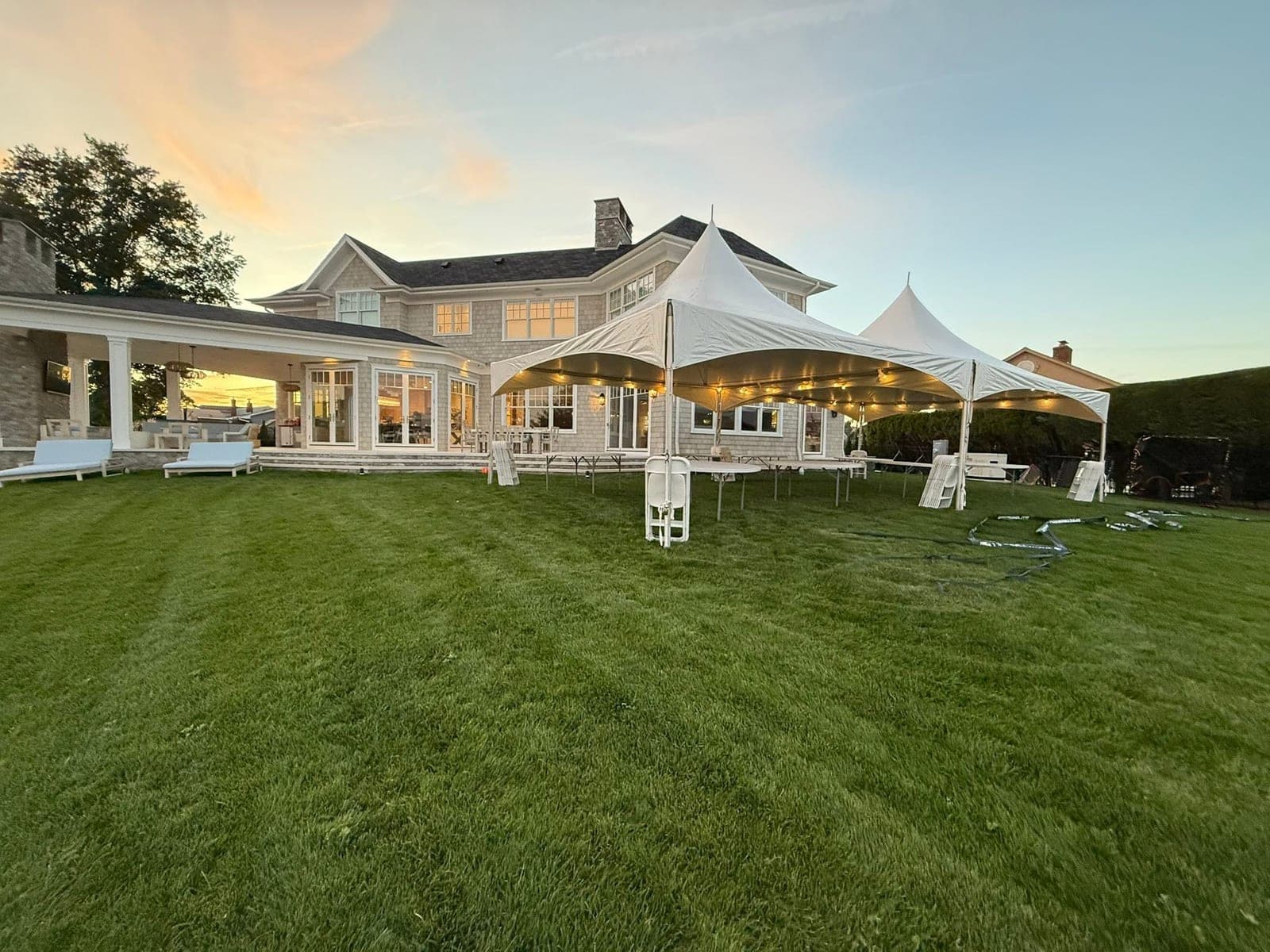 20 by 35 high-peak tent (two peaks): Two peaks, string lights, big lawn