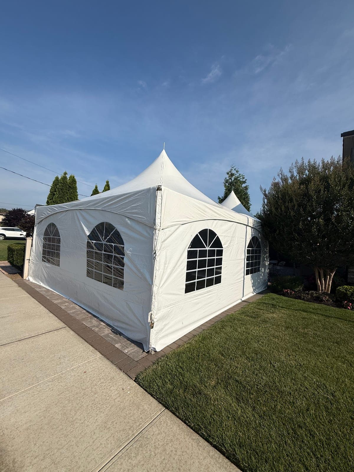 20 by 40 high-peak tent: 20×40 with sidewalls, windows all around