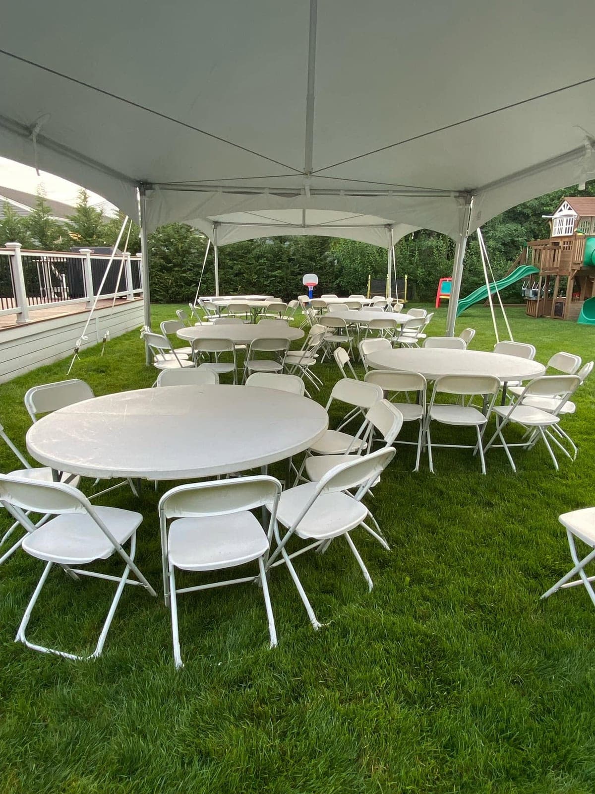 Inside a Tents UP tent: Rounds and chairs set