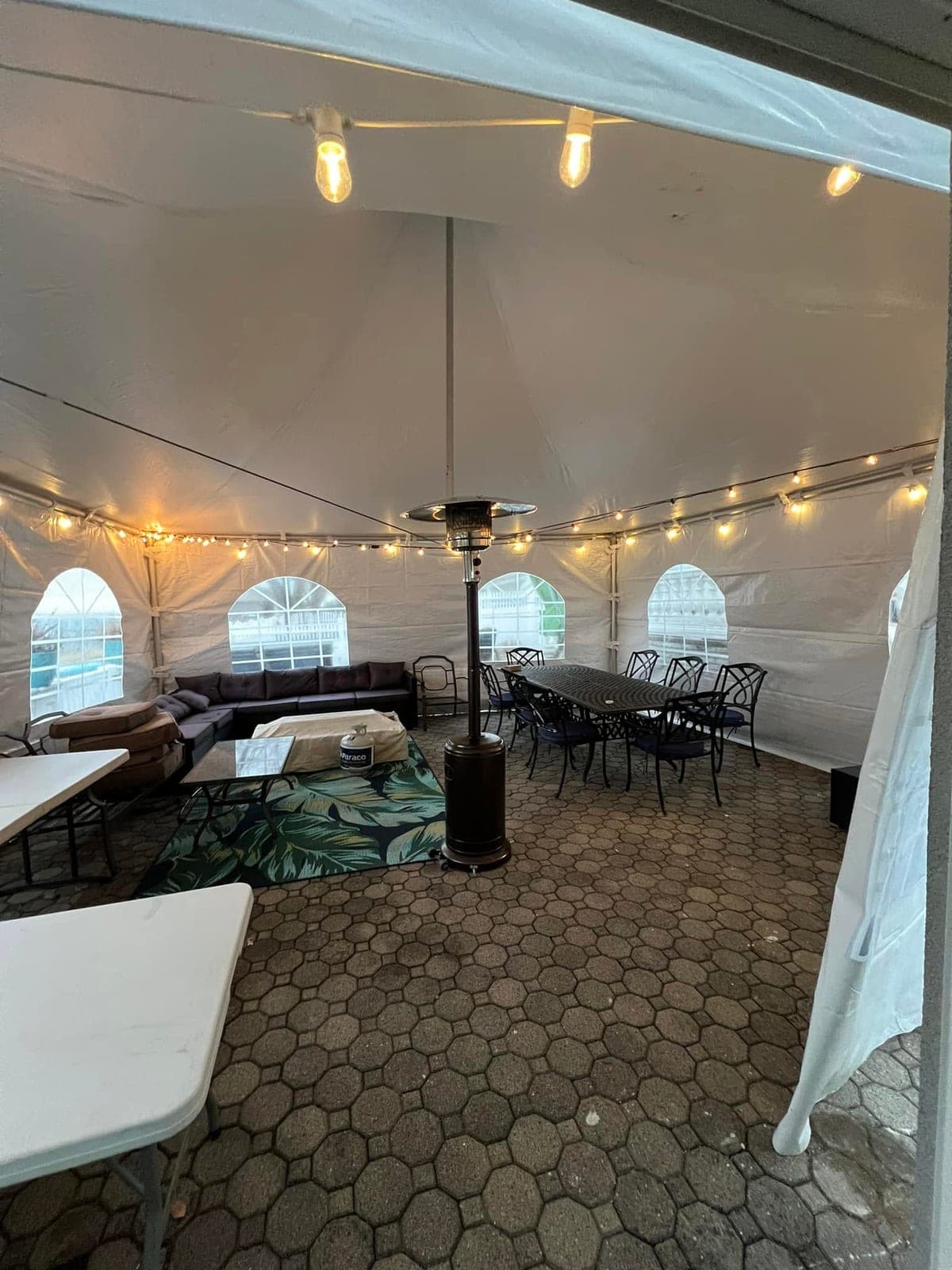 Inside a Tents UP tent: Inside a 20×20: sides and a heater